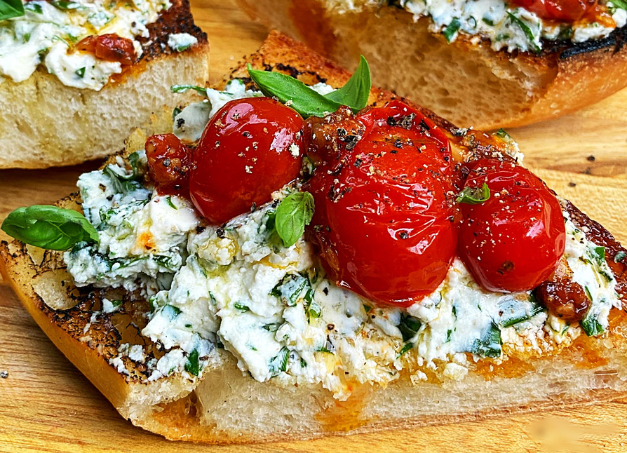 Garlic and Herb Goat Cheese Toasts with Blistered Tomatoes